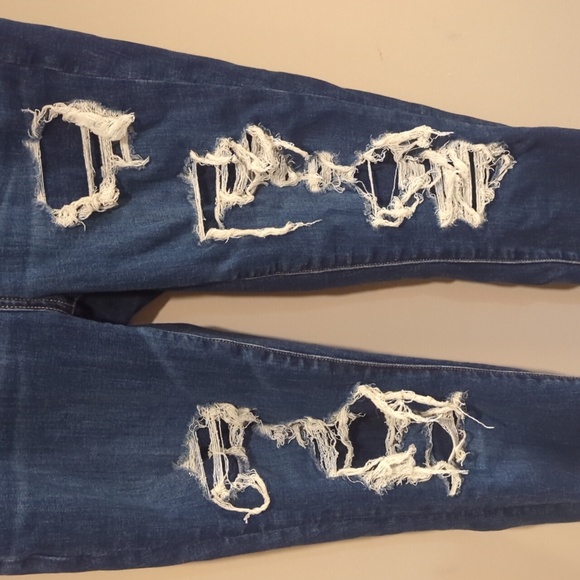 Lightly worn high waisted Size 10 AE stretch jeggings with distressed detail. - Picture 2 of 4